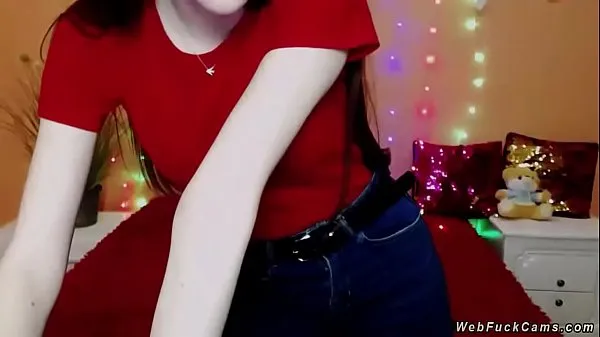 Big Solo pale brunette amateur babe in red t shirt and jeans trousers strips her top and flashing boobs in bra then gets dressed again on webcam show energy Videos